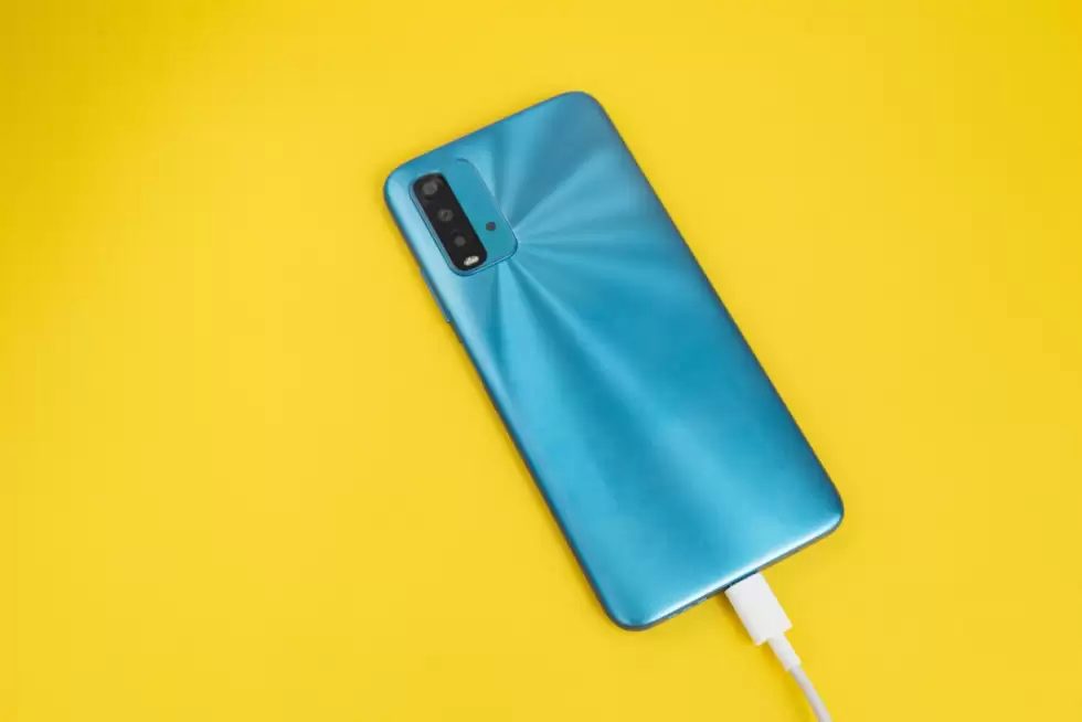 blue-cell-phone-connected-usb-cable-type-c-charging